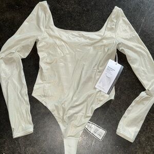 Lululemon wunderlust Bodysuit size small New with tags and liner
